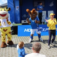 maimarkt-mannheim-kinderschminken-raffini-maskottchen-glitzer-tattoos-23
